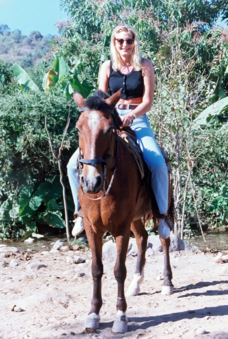 Cassandra Rox horseback riding in the Caribbean